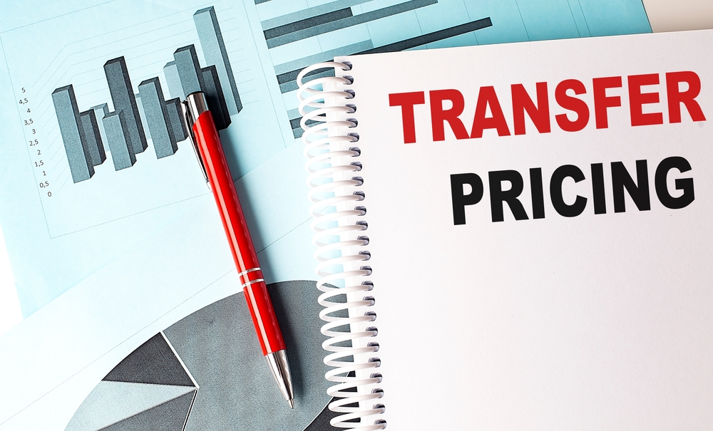 Transfer pricing written in a notebook.